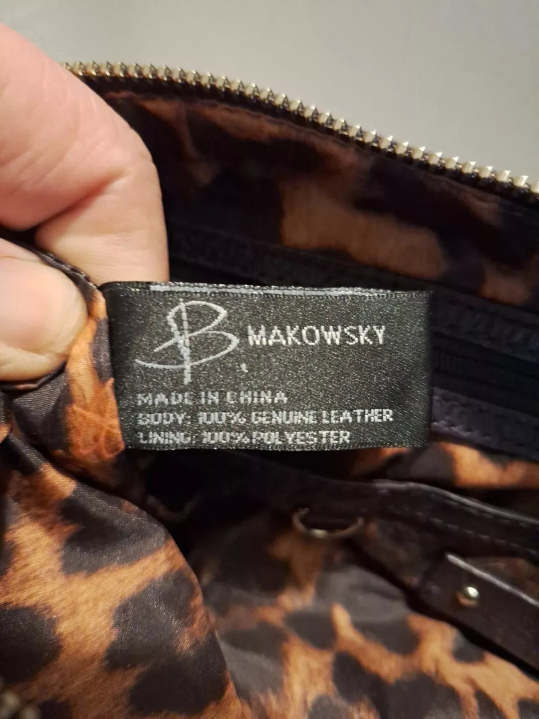B Makowsky Purple Genuine leather handbag Shoulder Strap Is Leather And Chain