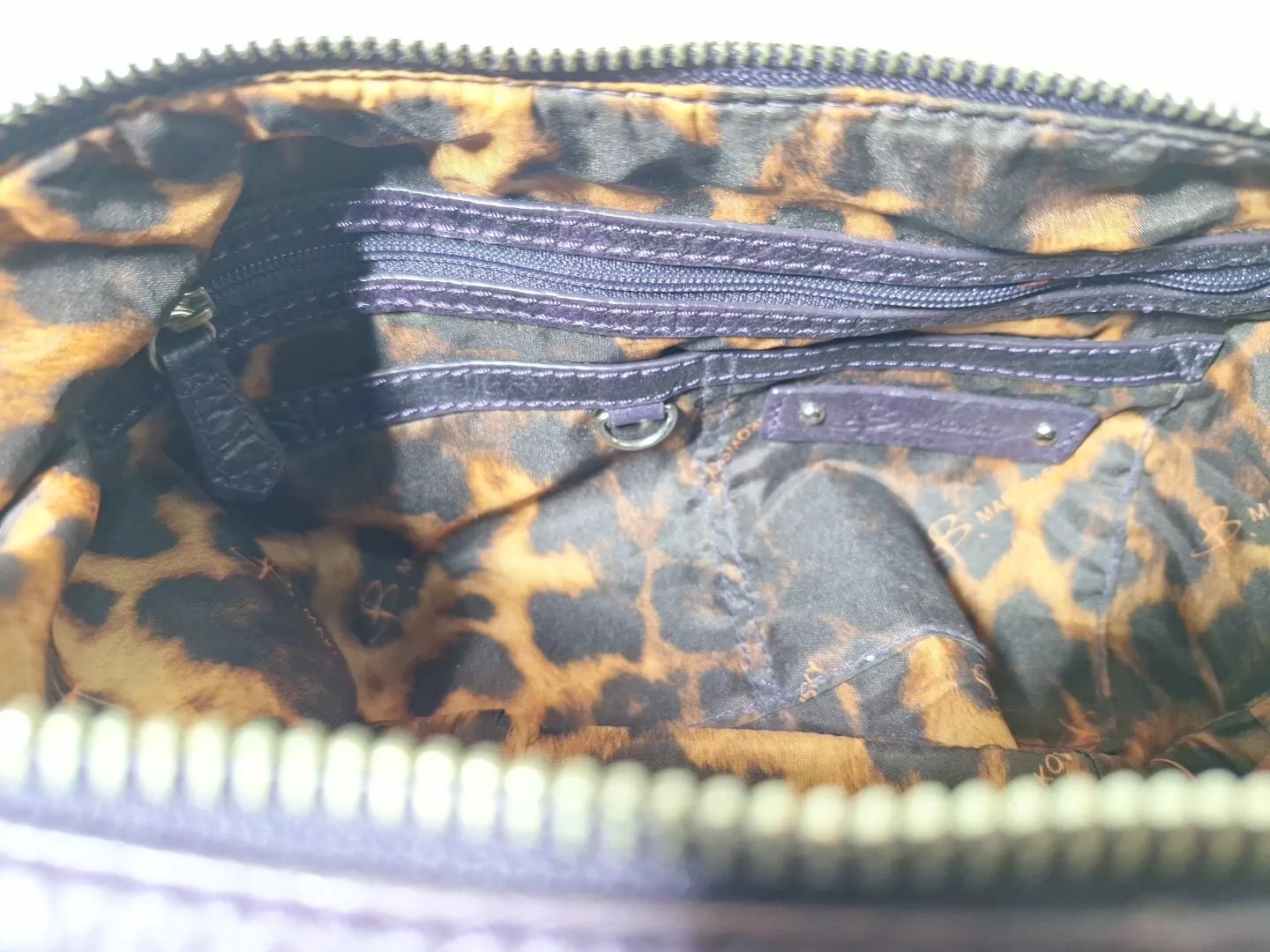 B Makowsky Purple Genuine leather handbag Shoulder Strap Is Leather And Chain